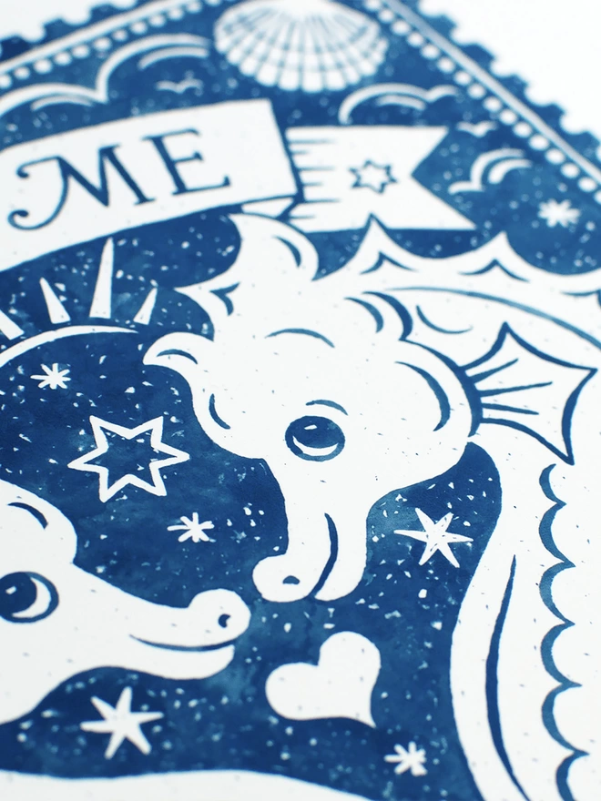 detail of blue and white seahorse print in watercolours