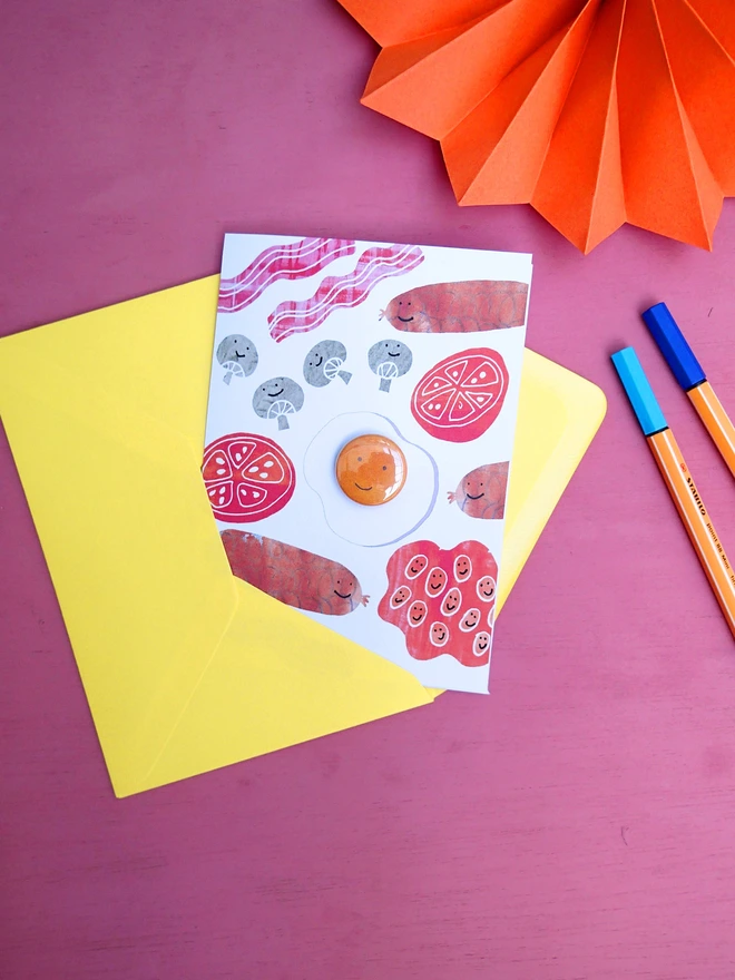 Greeting card with sausage, beans and egg
