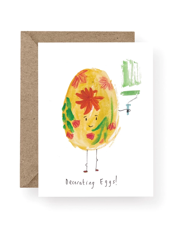 A Funny Easter Card Featuring a Decorative Easter Egg Holding A Painters Roller .  The Card Says Decorating Eggs!