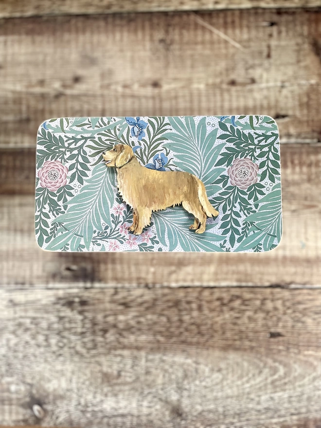 Golden retriever shape mounted onto a wooden dog keepsake box which is inlaid with a William Morris Print in the lid 