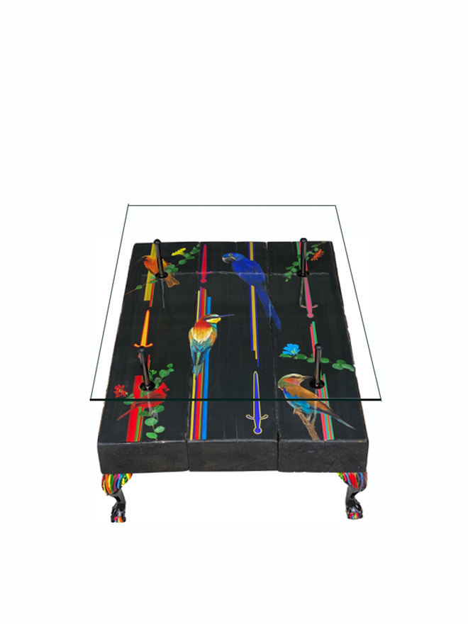 bird artwork coffee table with legs and glass top