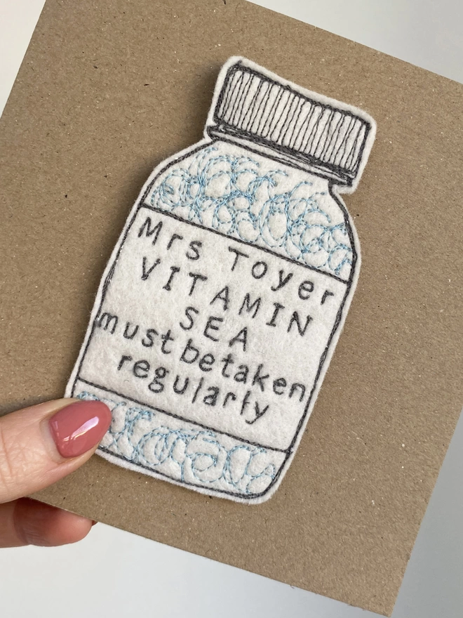 Vitamin Sea Personalised Medicine Bottle on a brown card