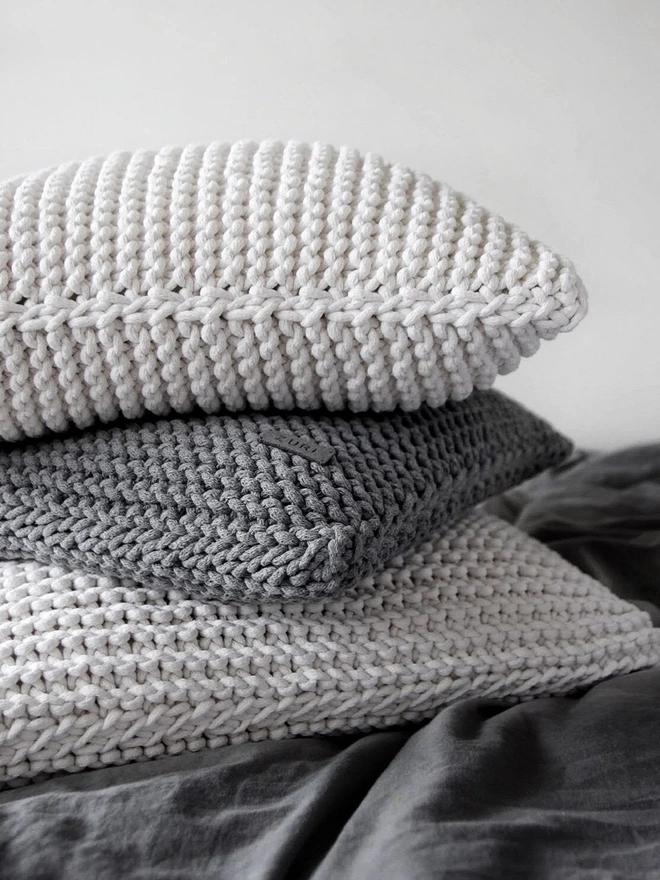 hand knitted grey cushions
