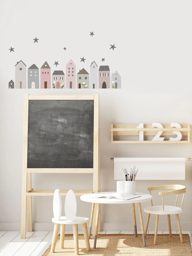 Kids playroom with chalk board and little village house wall stickers