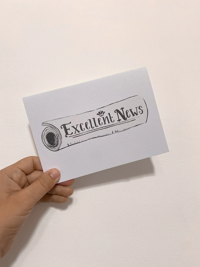 Excellent news card in hand