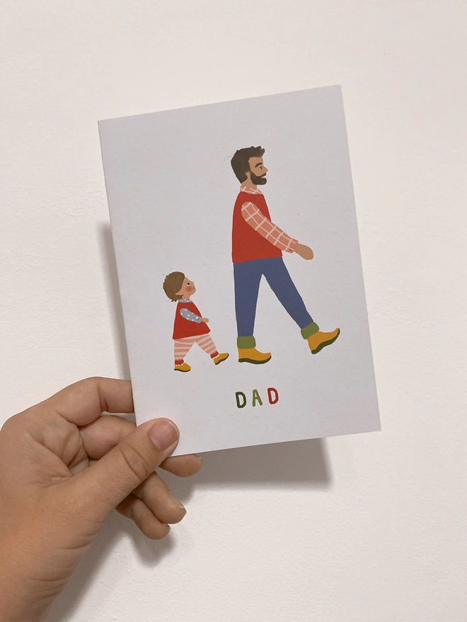 dad card in hand