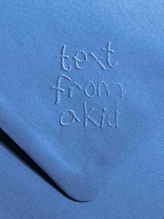 Bright blue text from a friend envelope