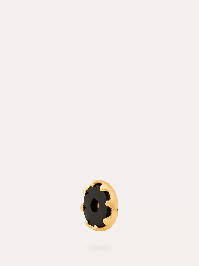 side view of black onyx gold disc charm