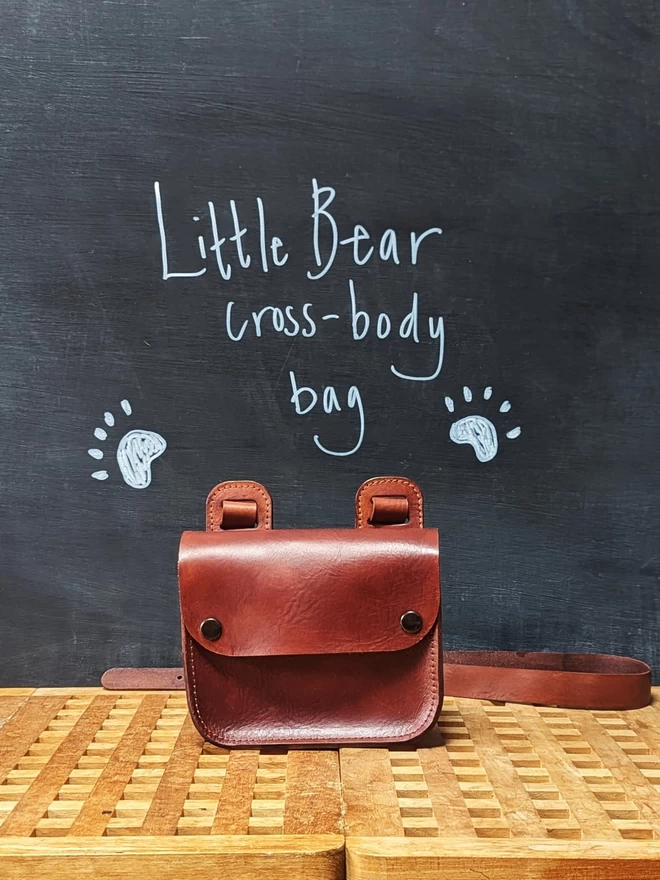 Hand dyed Leather 'Little Bear' cross- body bag, front view.
