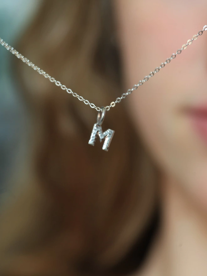 silver letter charm 
