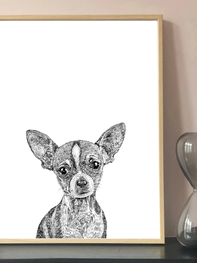 Art print of a hand drawn portrait of a chihuahua displayed in a frame