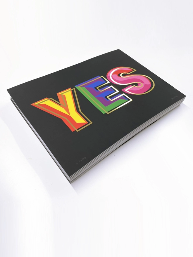 Rainbow coloured typographic print with gold foil detail