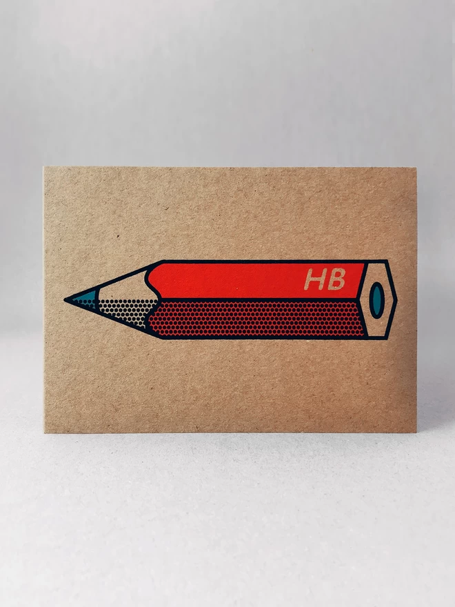 A red pencil design on brown Kraft card, with black outline and half tone detail. In a light grey background with soft shadows