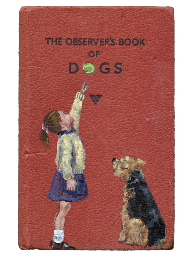 a print of an aged observer book of dogs with a little girl pointing to a tennis ball and an airedale terrier or welsh terrier look up