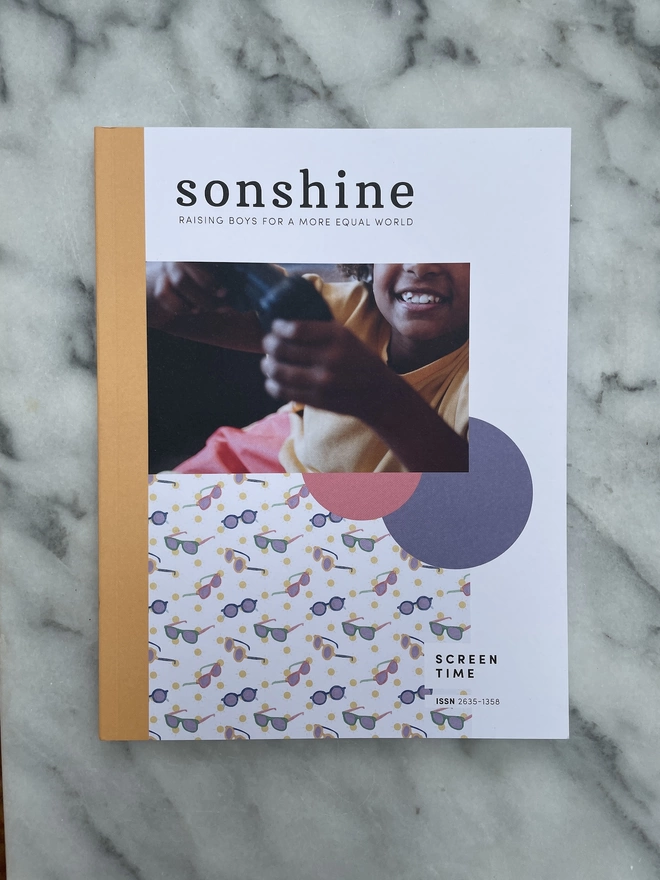 Sonshine Magazine Issue 16: Screen time a paper magazine featuring a photograph of a child holding a gaming controller and smiling as they play
