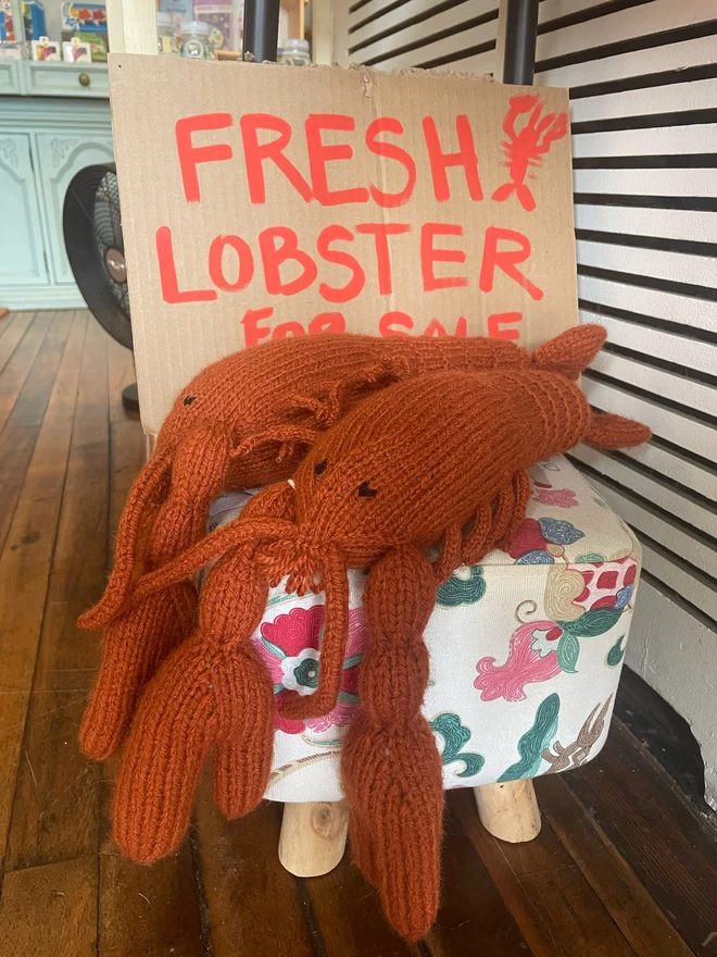 Knitted toy lobsters in red for sale