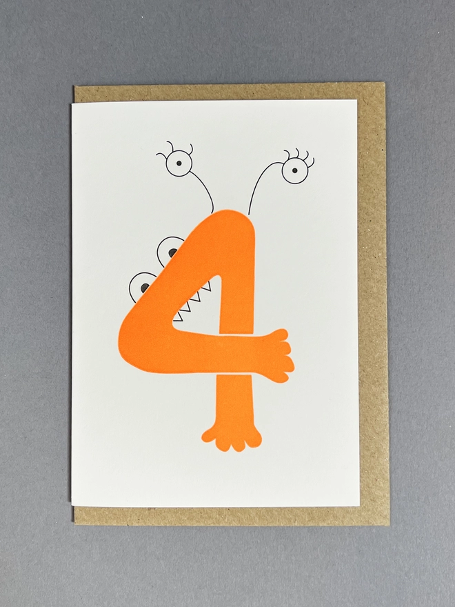 Letterpress printed neon orange number four card with envelope for chidren's birthday