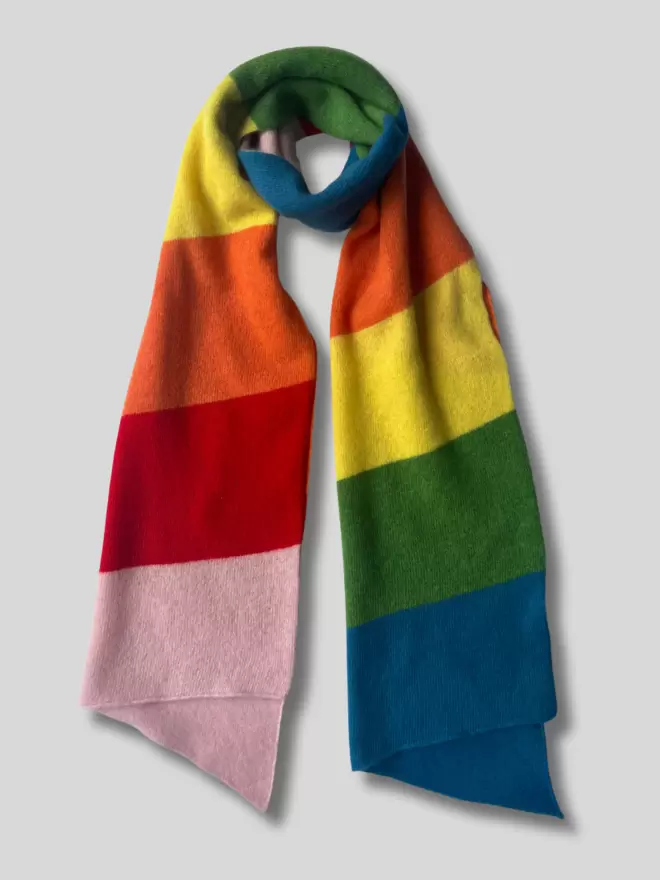 Rainbow stripe scarf shown flat on white background 