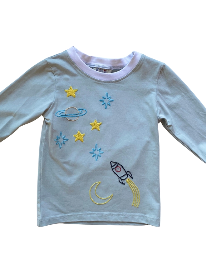 Pale blue grey two piece pyjamas with a hand-embroidered space scene and white collar and cuffs