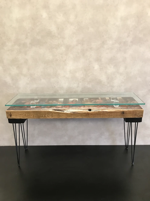 console table with image of the last supper on the top surface