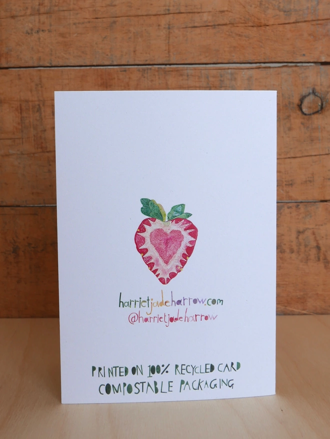 The reverse of the Strawberry Heart Card showing small illustration of red & pink berry with leaves