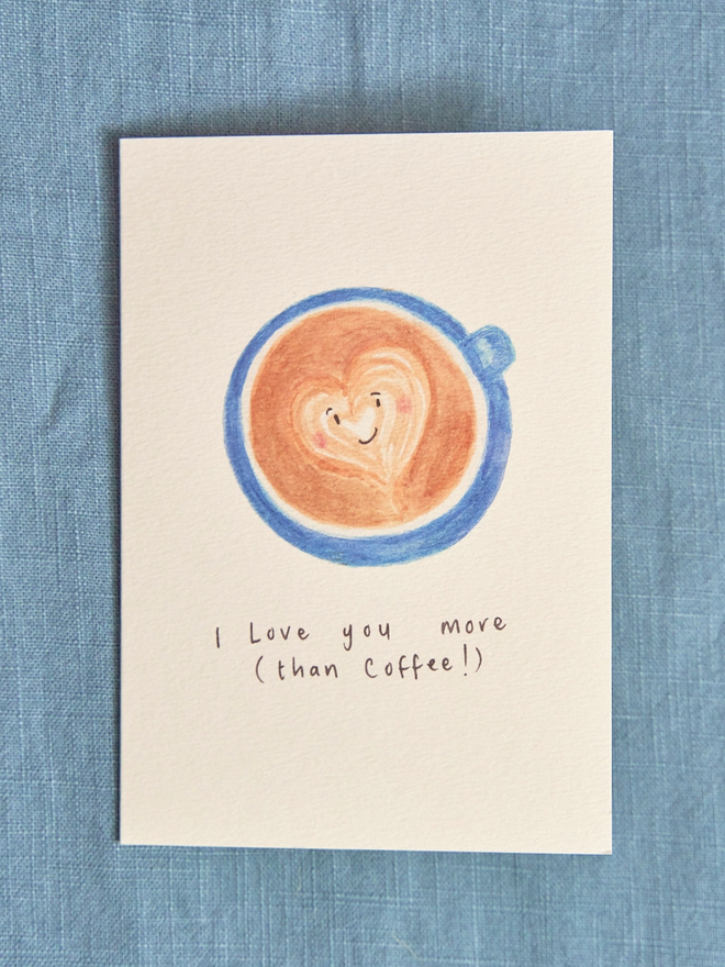 I Love You More than Coffee Greeting Card.  An illustrated Cup of Coffee with a Smiley Face.  
