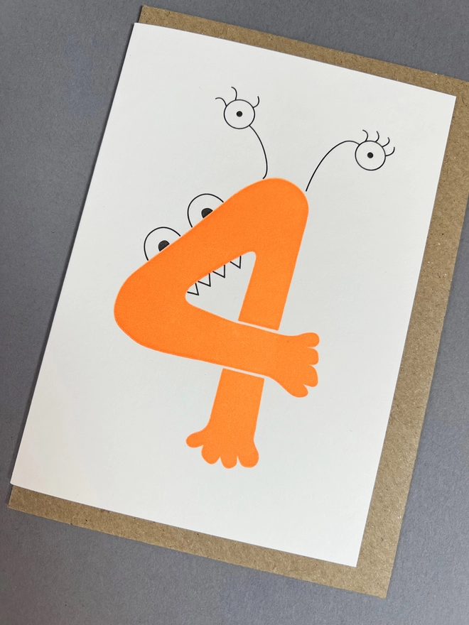 Neon orange Alien number four celebration note with four eyes and four teeth