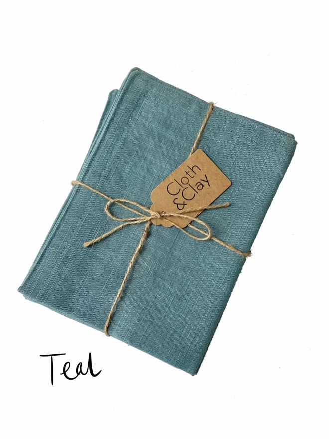 Teal placemats x2