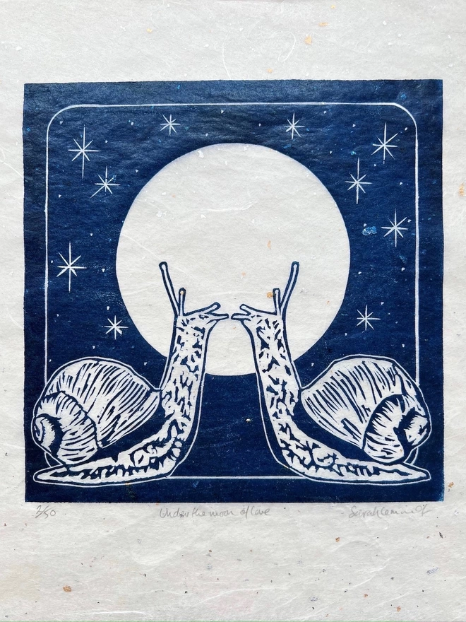 detail of snails and full moon linocut