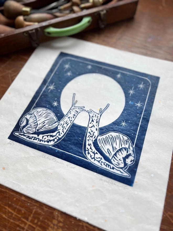 snails and full moon linocut print 