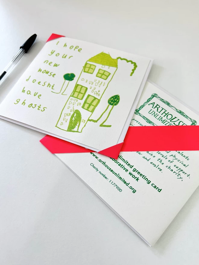 I Hope Your New House Doesn't Have Ghosts card with a simple house & garden in bright fluro greens