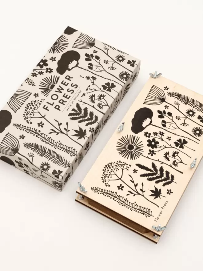 Monochrome floral illustration flower press and packaging