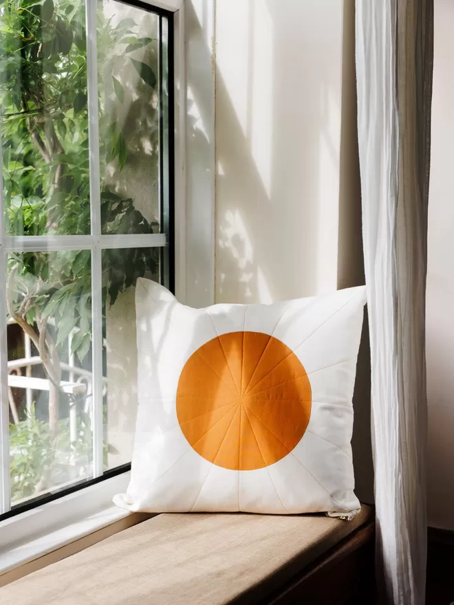 Sunburst Quilt Cushion On Window Seat