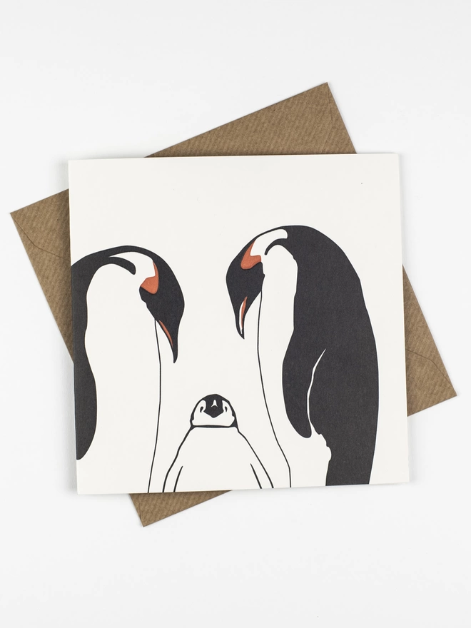 Full image of the penguin family big card that is letterpress printed and designed in the UK