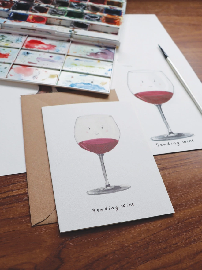Sending Wine Greeting Card on desk with original illustration 