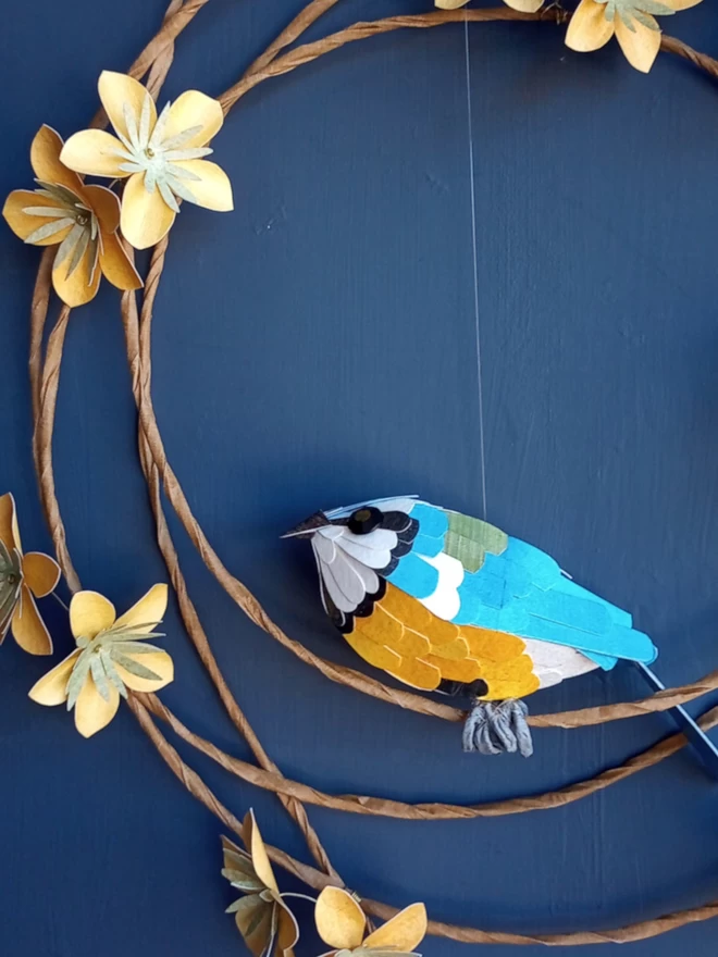 Blue tit sculpture, made from paper.