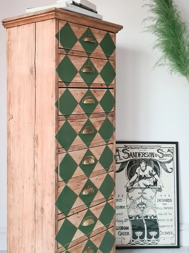 Antique wooden tallboy upcycled with green harlequin print hand-painted