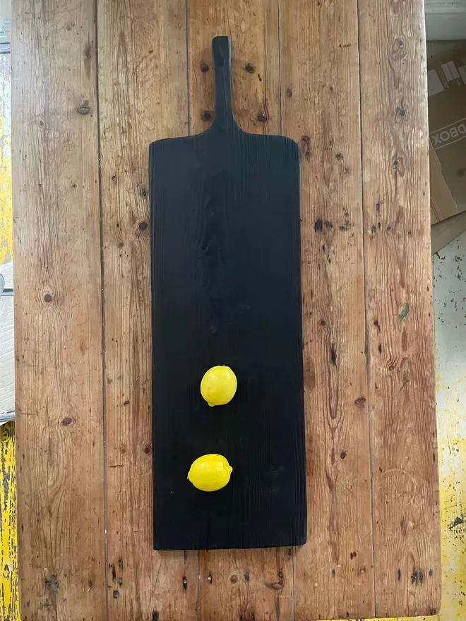 Long Charred Black Serving Board With Lemons