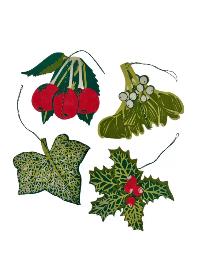 White cut-out shot: all 4 red and green christmas decorations