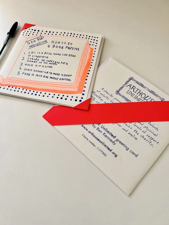 A new baby card with a list of funny new baby instructions printed in fluro orange & deep blue