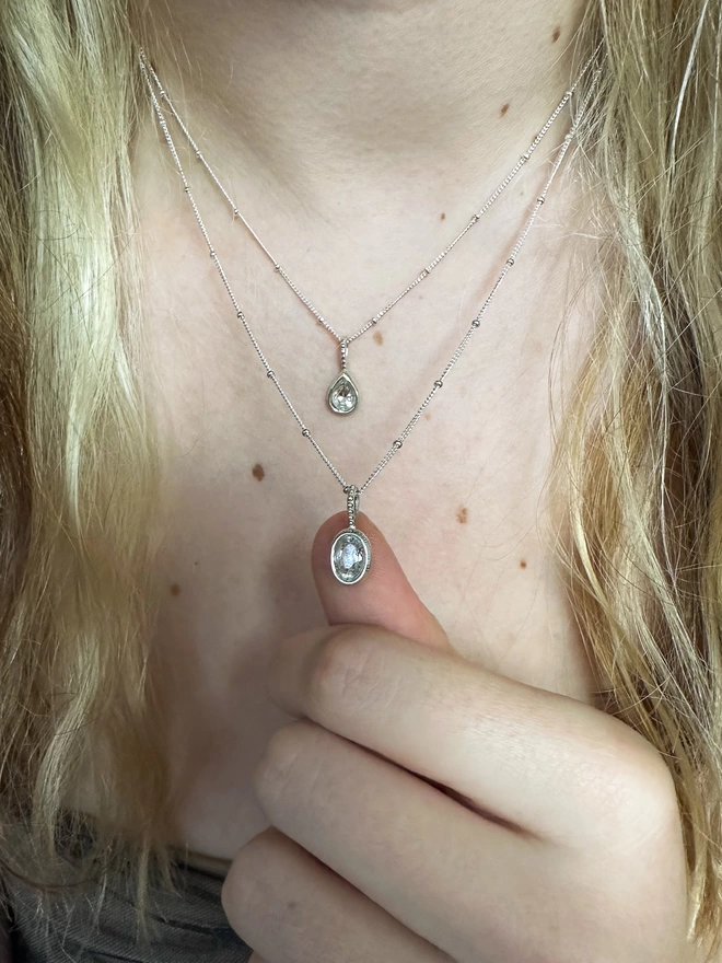 Sparkling silver topaz oval necklace 