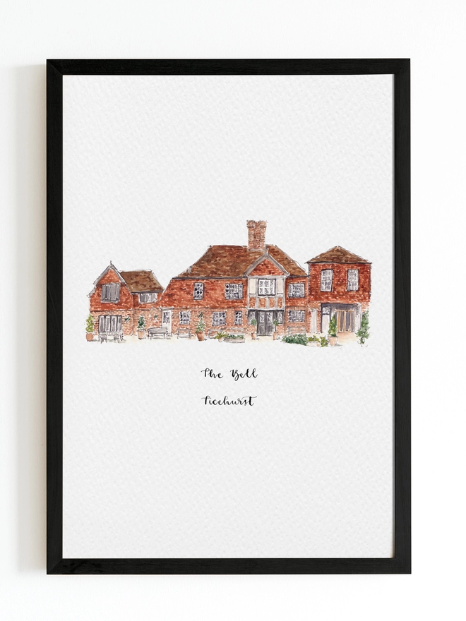 Watercolour painting of The Bell in Ticehurst, a beautiful brick building with a teracotta tile roof, small black framed white windows and seats and planting outside. The watercolour style is painted with a black pen outline and organic loose style with small details. The print is on white background with black frame around.