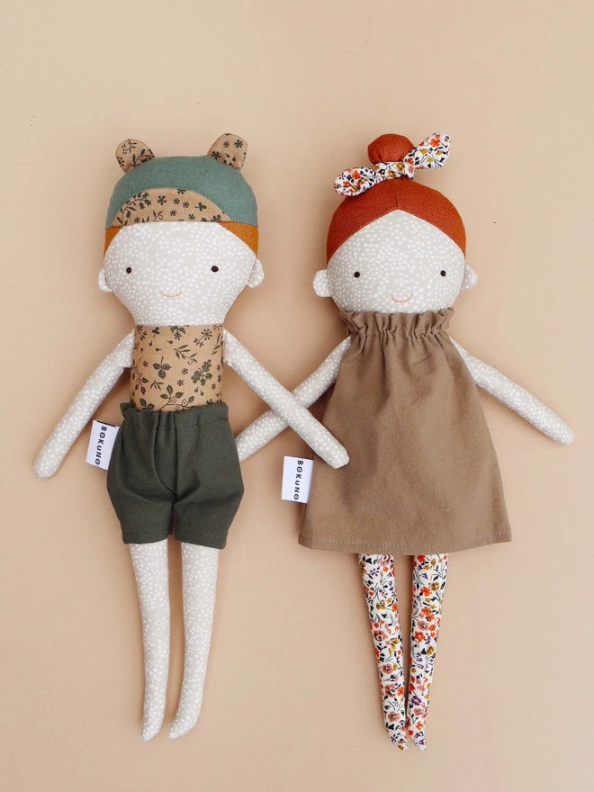 boy and girl doll with freckled face and ginger hair