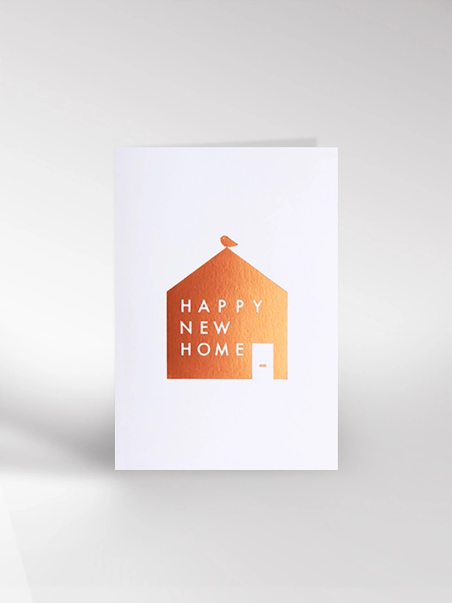 New home card with copper house and bird graphic 