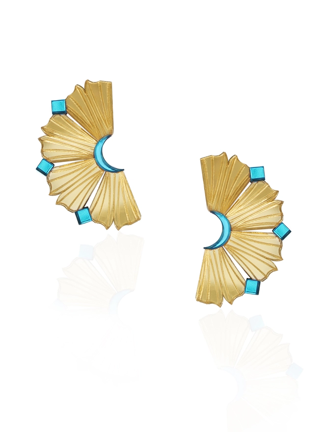 A pair of earrings that resembles like coral wall of Kenyan Island, Lamu. The earrings are in gold colour with 3 Aqua small cubes dotted on the edge and on the inside part of the earrings in crescent shape. The gold acrylics have texture which resembles similar to sliced pineapples.