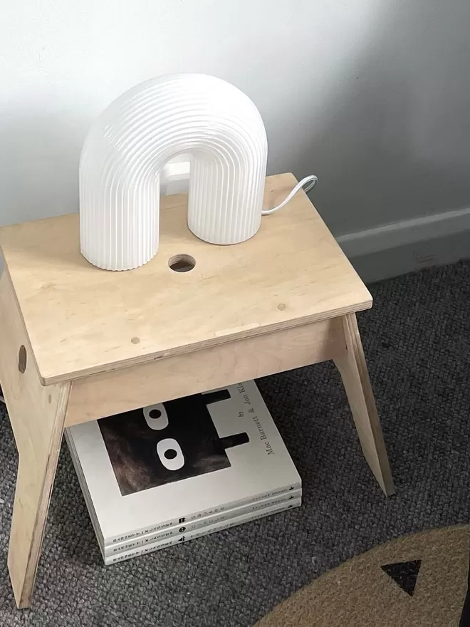 Perch as a side table with a lamp