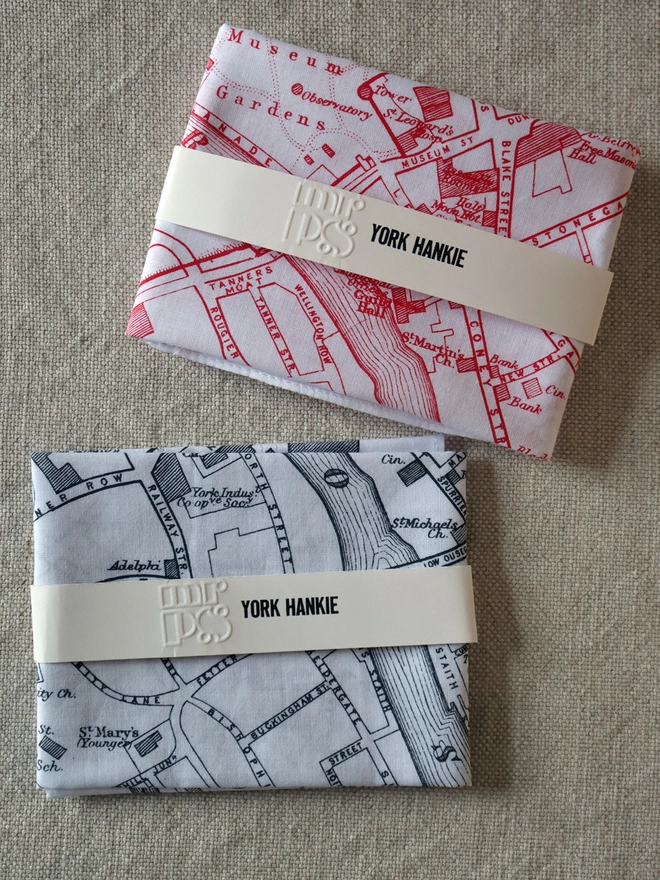 Two folded Mr.PS York map hankies to show the colour options available: grey and red