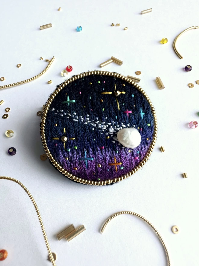Cosmic comet brooch and beads