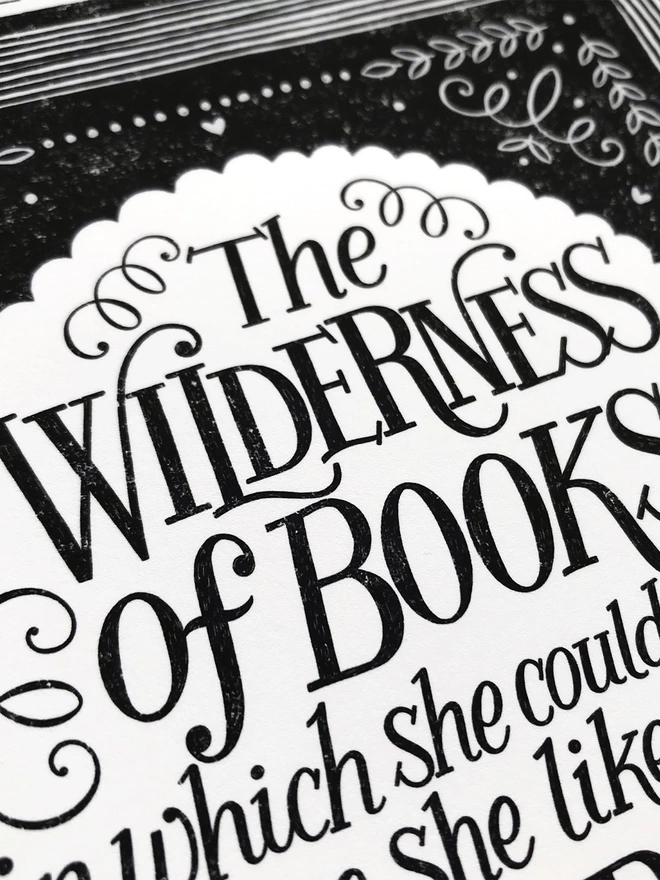 detail of a black and white hand lettered quote