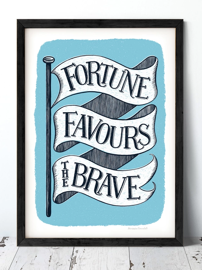 fortune favours the brave encouragement flag print in blue and white in a black frame